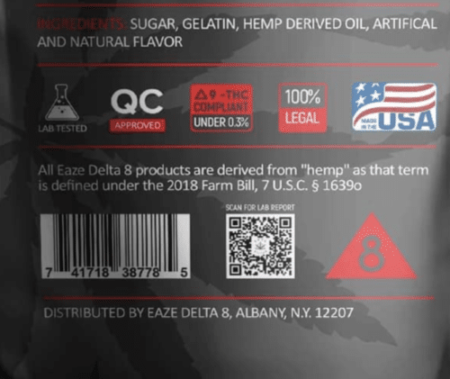 Close up on eaze delta 8 thc gummy package says its distributed by a corporation registered in albany, ny.